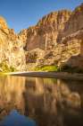 USA, Texas, Big Bend National Park. Chisos Mountains and Rio Grande River reflection. Art Print